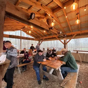 a group of people sitting at tables