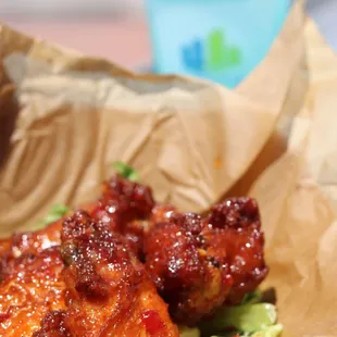chicken wings in a paper bag