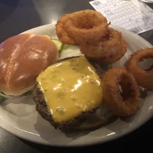 Cheeseburger deluxe with onion rings. Very juicy and tasty.