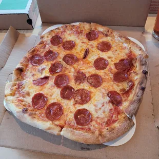 Got bumped around a bit after I picked it up, but it was otherwise a perfect Pepperoni Pizza