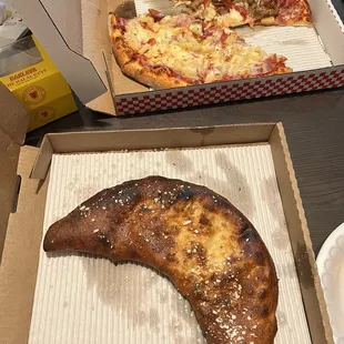 Calzone and large pizza (leftovers bc are some lol)