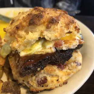 Son made a breakfast sandwich with a little bit of everything off his traditional breakfast plate.