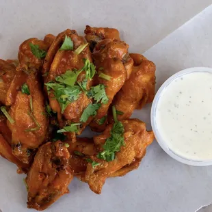 Our 10 piece wings come with a side of housemade ranch