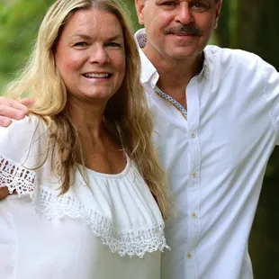 a man and a woman posing for a picture