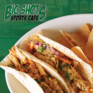 a plate of tacos and chips