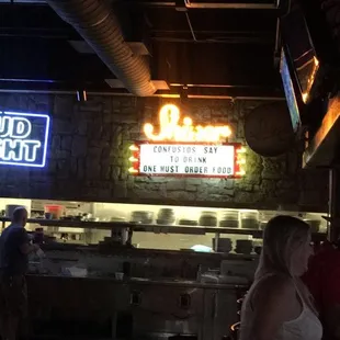 people sitting at the bar