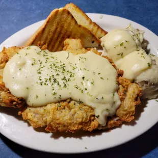 That is a big chicken fried steak. It was very delicious.