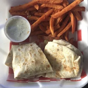 Buffalo ranch chicken wrap (mild) with sweet potato fries.