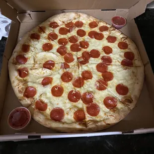 Create Your Own 18 inch Pizza ($14.95). Ended up being $19.45 since we added garlic and pepperoni.