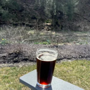 Enjoying a Porter by the creek