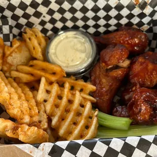 Seasoned fries included with the wings delicious.