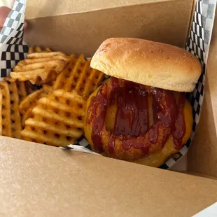 This cheeseburger was actually topped with a big onion ring!