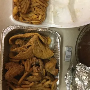 Fish, wings, shrimp, and fries.