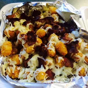 Bacon Ranch Dusted Tater Tots with Melted Cheese On Top. So Good!!