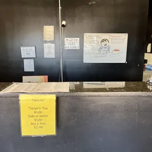 The front desk area. Look at the specials board.