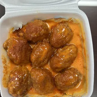 8 boneless wings with Napoleon Complex Sauce