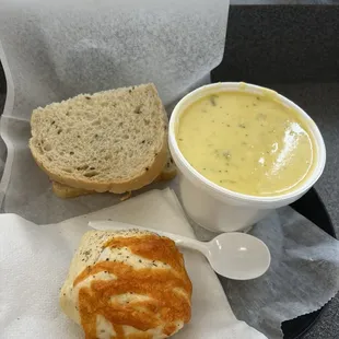Half sandwich, 12 oz broccoli cheddar soup, and a garlic knot.