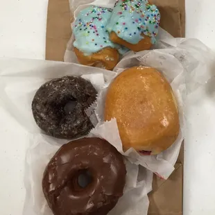 2 Blue ScrumpNuggets (not sure what they&apos;re really called), Choc. Glazed, Glazed Rasp. Jelly, Choc. Frosted Glazed