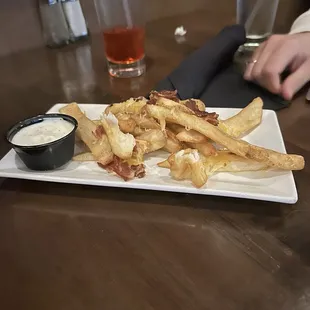 Poor excuse of cheese fries.