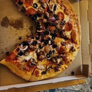 a whole pizza in a box