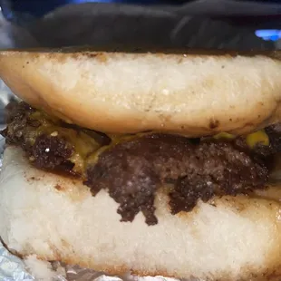 Forgive the not great photo. But this burger is amazing. The Classic without pickles.