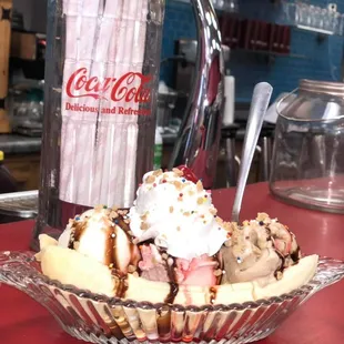 a banana split with ice cream and whip cream