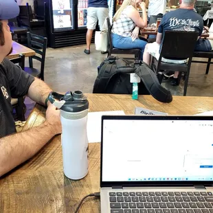 Space for laptops. Husband for scale .