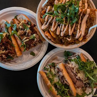 three plates of food on a table