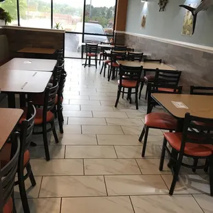 tables and chairs in a restaurant