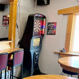 a game machine in the middle of the room