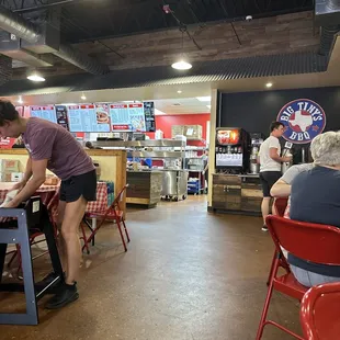 Order at the counter. Then sit.