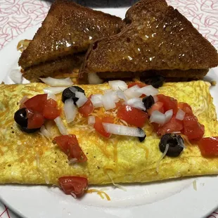 Mexican Omelet Hash browns under the toast