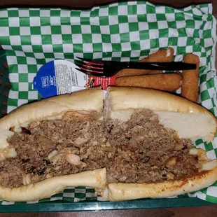 #19 Philly with shrimp and side of cheese sticks.