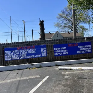 a parking lot with signs
