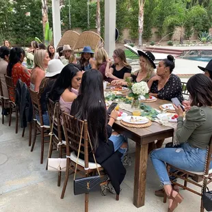 The farmhouse tables and beautiful wooden chairs.