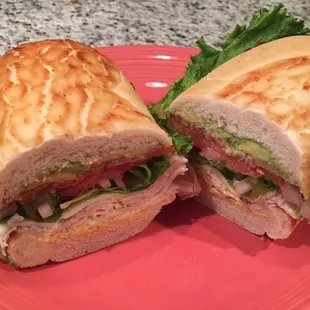 Giant Sequoia: Turkey, Bacon, Avocado, Mayo, Mustard, Lettuce, Tomato, Red Onion, Cheese on a Dutch Crunch. Yummy :)