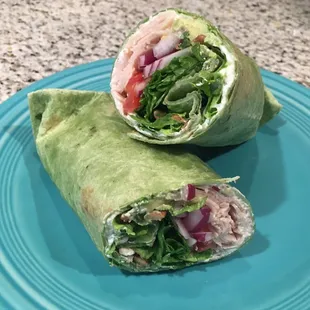 California Dogwood: Cream Cheese, Turkey, Avocado, Lettuce, Tomato, Red Onion, Chopped Pecans, Blue Cheese, Raspberry Vinaigrette.