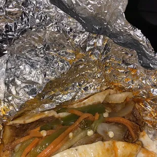a close up of a taco