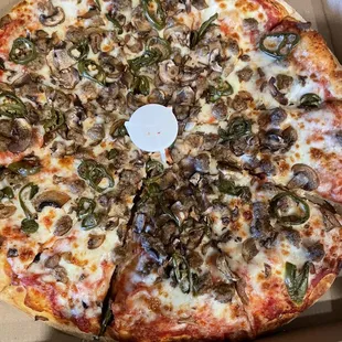 a whole pizza in a box