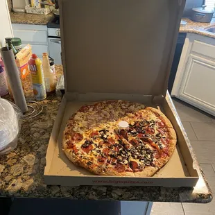 Pepperoni and mushrooms with pineapple and ham.