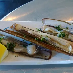 Sautéed razor clams in olive oil and parsley. GOOD CHIT THIS IS!