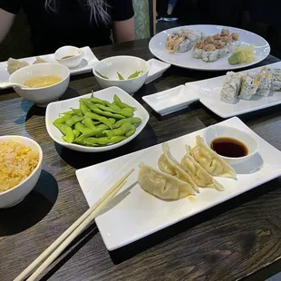 fried rice, edamame, steamed gyoza, california roll, spicy salmon tuna roll