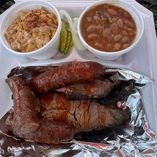 Two 2 Meat Plate with spicy street corn and BBQ Beans