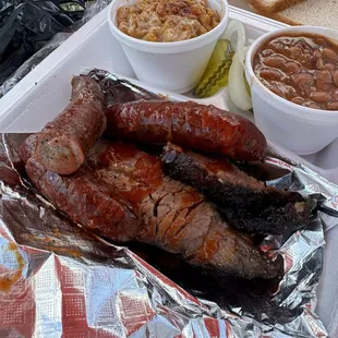 Burnt end side view  Sausage brisket and sides