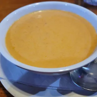 a bowl of soup on a plate
