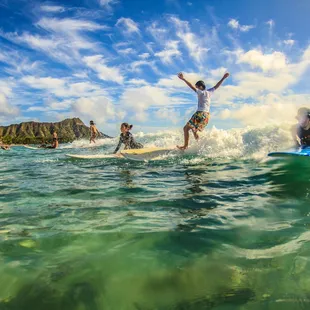 SURFING FUN, falling is most of the real fun, learn to surf in waikiki hawaii