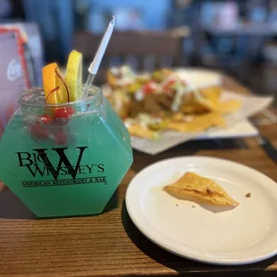 $6 Happy Hour Nachos and $12 Aloha Fishbowl Cocktail