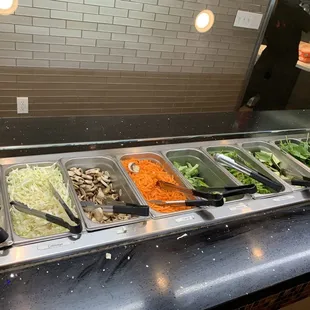 ows a variety of salads