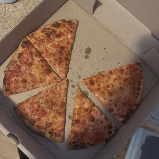 Supposedly a meat pizza. Cold and no toppings.