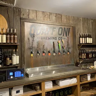 beer taps on a wooden wall
